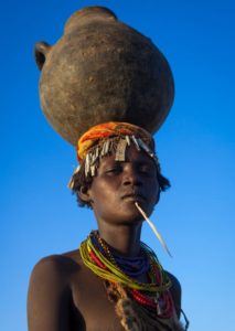 Ethiopia, Omo Valley, Omorate, Dassanech Tribe Woman With A Calabash On Her Head